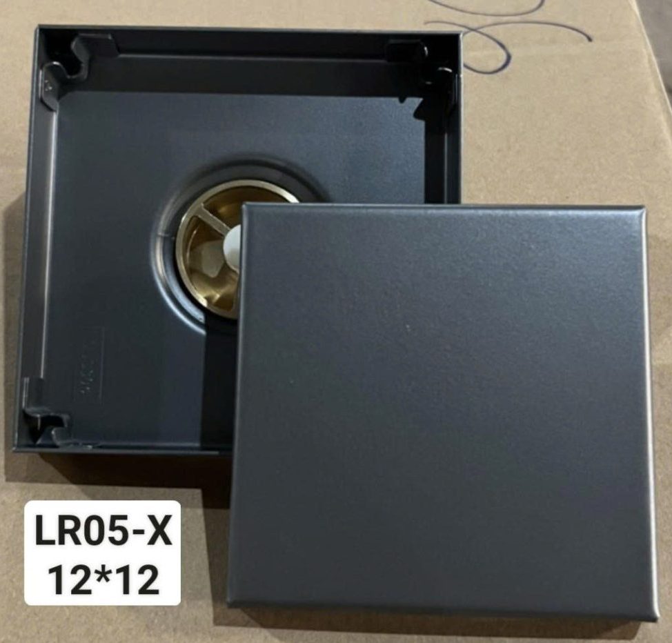 HỄU THU SÀN TÀNG HÌNH LR05-X 12*12 MÀU XÁM